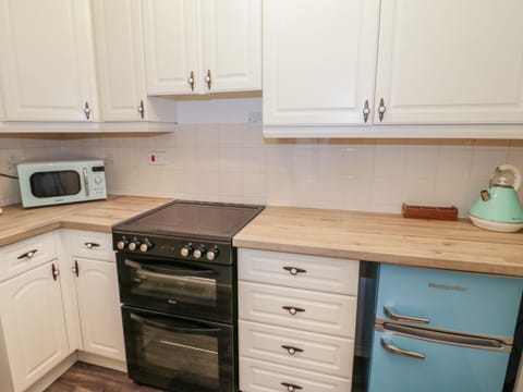 Fridge, toaster, cookware/dishes/utensils