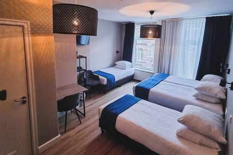 Standard Quadruple Room | Individually decorated, individually furnished, desk, iron/ironing board