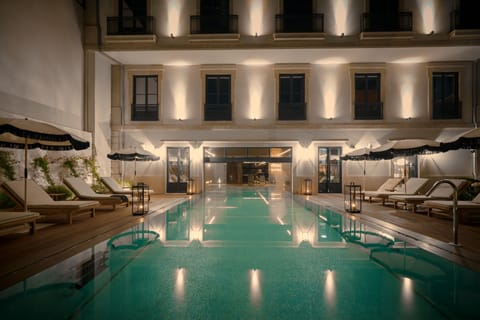 Indoor pool, outdoor pool, open 8:00 AM to 8:00 PM, pool umbrellas