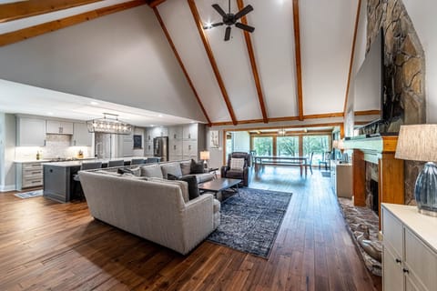 Open floor plan with vaulted ceilings gives the feeling of plenty of space for all guests.