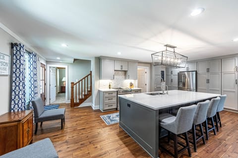 Enjoy this open kitchen plan to prepare a meal but still be part of the crowd.