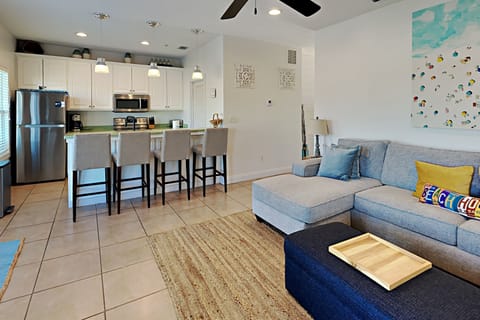 Condo, 1 Queen Bed, Balcony (#214E) | Living area | 40-inch flat-screen TV with digital channels, TV