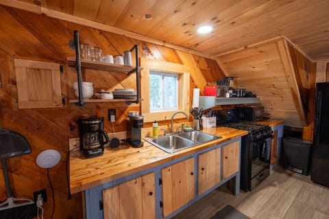 Cook, sip, and enjoy — the cabin kitchen makes it easy.