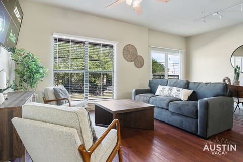 Spacious and open living and dining room with smart tv
