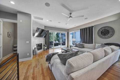 Modern Style TownWelcome to your next fun filled city skyline view retreat! Starting off with the living room featuring a large L shaped sofa, wall mounted HDTV, fireplace and easy access to the covered private patio! The perfect room as the day comes to 