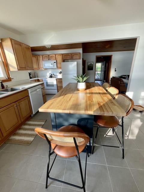 Fully remodeled kitchen, stocked w/ dishes/glassware, cookware, utensils & more.