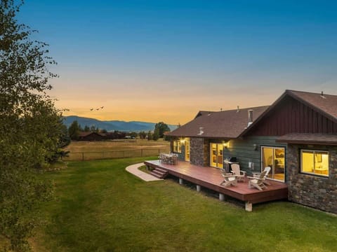 Enjoy the large deck & lawn, with beautiful views of the Big Hole Mountains to the West. 