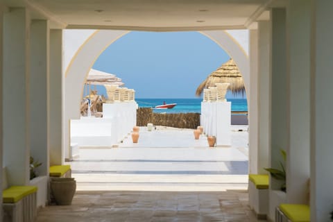 Private beach, white sand, sun loungers, beach umbrellas