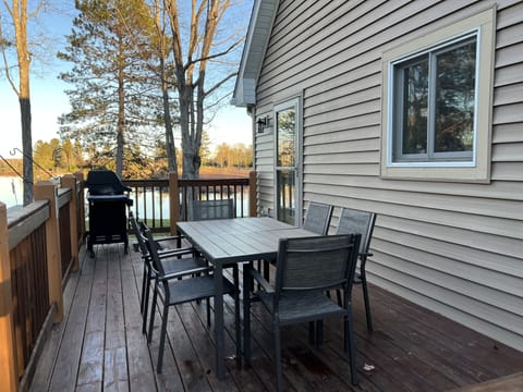 Cook a delicious meal with a Weber Gas Grill while overlooking the lake.