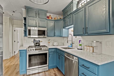 Kitchen with lots of charm and stainless steel appliances including gas range 