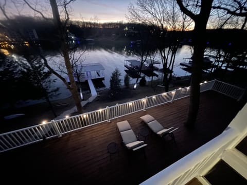 View of dock & cove from top deck at night! So peaceful.