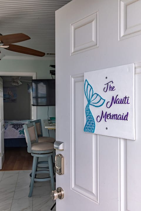 Step inside The Nauti Mermaid and get your first glimpse of the space. The entry opens directly into the condo, setting the tone for a clean, well-cared-for retreat just moments from the beach.