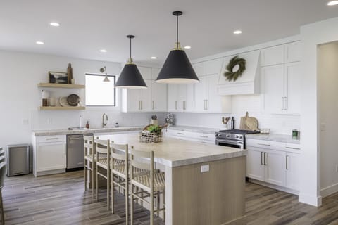 Kitchen Island - The Kitchen Island comfortably seats 4 adults and creates a great space for serving and preparing meals.