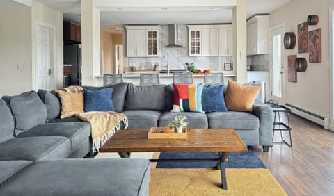 Open kitchen behind living room