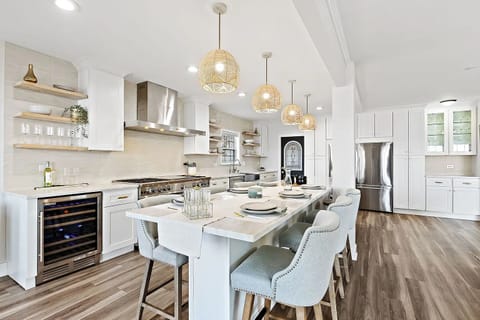 Fully stocked kitchen, seating for 9 @ island, 4 in gazebo, & folding table/6chr