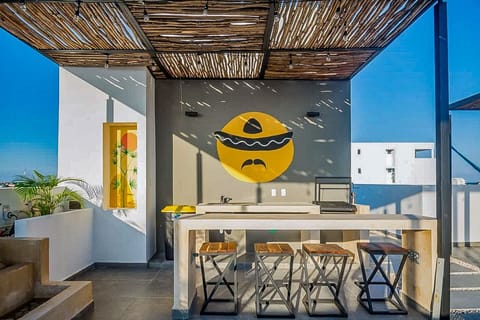 Cozy room with tables and chairs in Playa del Carmen rental