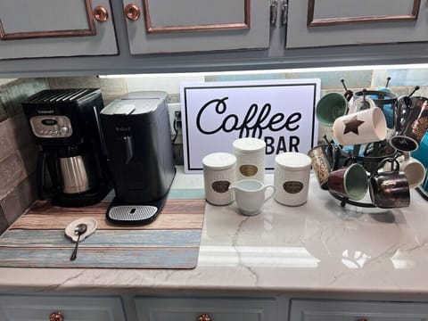 Keurig, Nespresso, and drip coffee with pods, sweeteners, and creamers