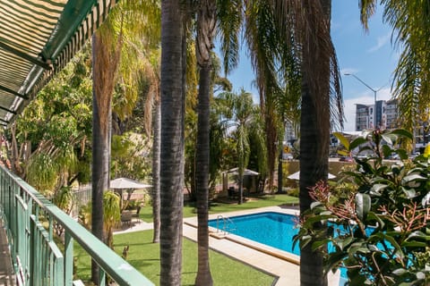 Outdoor pool, pool umbrellas, sun loungers