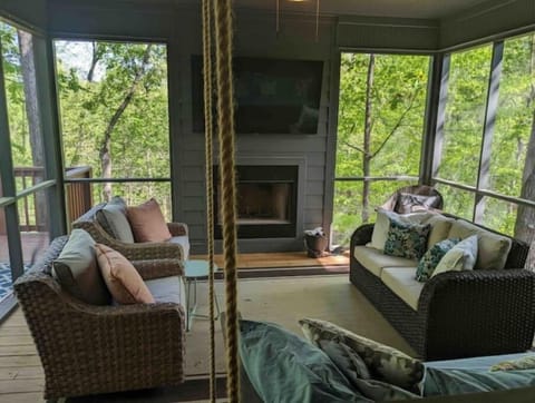 The screened in porch is a guest favorite. We love the outdoor fireplace.     