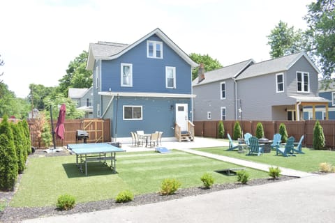 You’ll love all the recreational possibilities in the fenced backyard – cornhole, ping-pong,  putting green, outdoor dining, grill, and firepit.