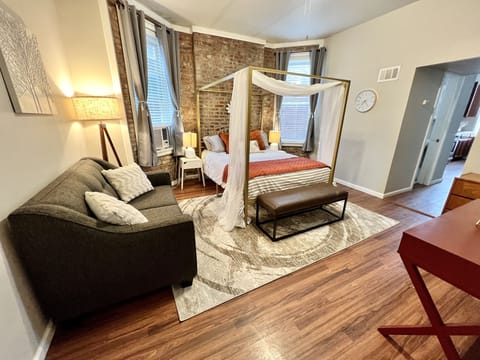 Large studio with love seat and desk