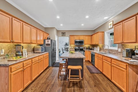 Cook up a feast in our fully-equipped kitchen with modern appliances and ample counter space.