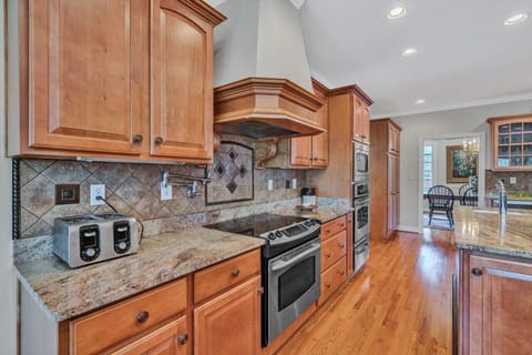 Cook up a feast in our fully-equipped kitchen with modern appliances and ample counter space.