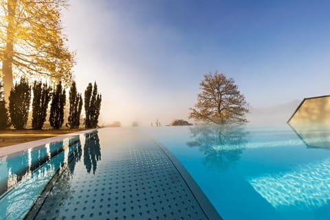Outdoor pool, pool umbrellas, sun loungers