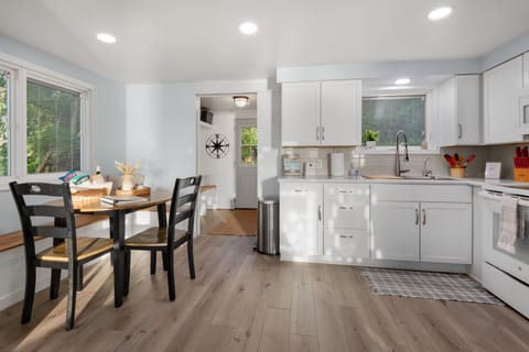 Our spacious open concept kitchen and dining area is perfect for gathering!