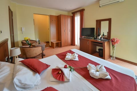 Premium bedding, memory foam beds, in-room safe, desk