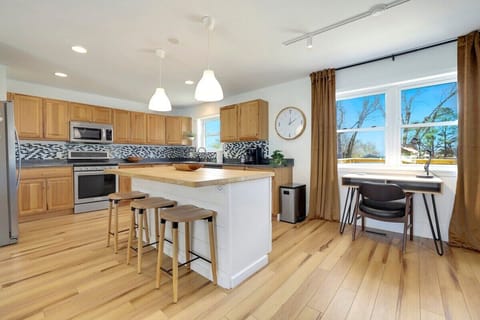 To the left, you'll see our fully stocked kitchen.