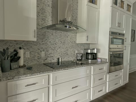 Coffee pot, Air Fryer, stove, oven, microwave, fridge, dinning/cooking utensils