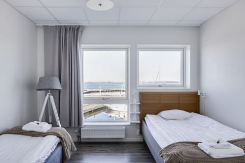 Family Apartment, 2 Bedrooms | Desk, laptop workspace, blackout drapes, soundproofing