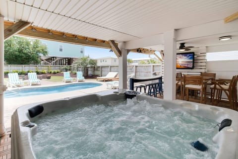 Feel those relaxing Bubbles; hear the low hum of the jets. Who else can watch the Big Game this way? Image shows grill but the is No gas grill.