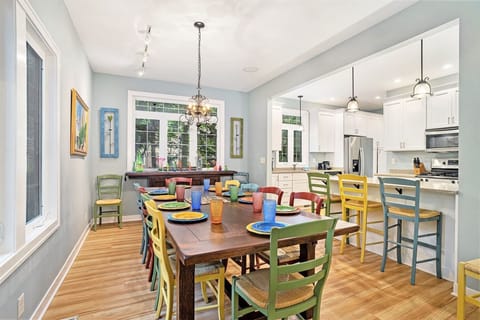 Dining room is adjacent to the kitchen with snack bar