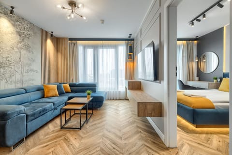 Apartment, 1 Bedroom | Living room | 40-inch flat-screen TV with digital channels, TV