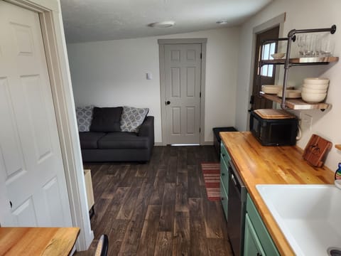 Bathroom on the left, bedroom straight ahead.