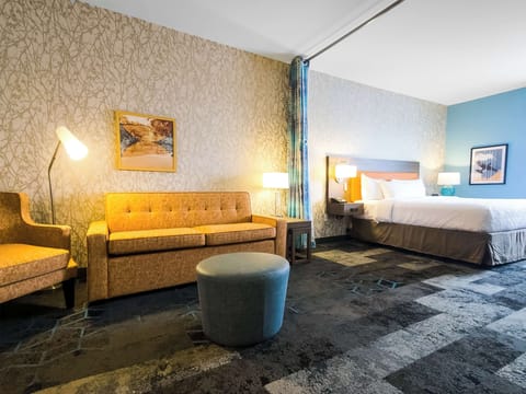 Desk, blackout drapes, iron/ironing board, free cribs/infant beds