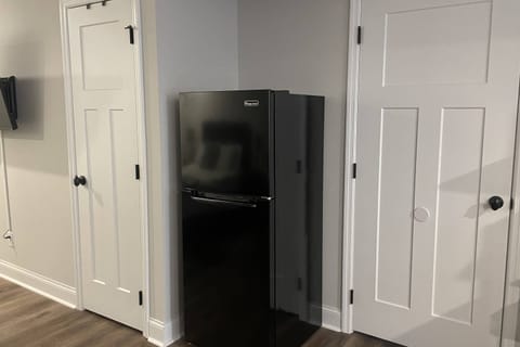 Full sized refrigerator has been recently been added to the property