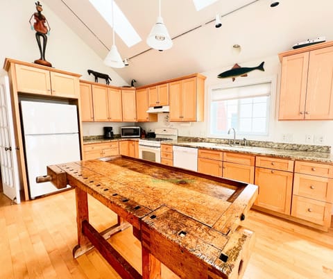 Kitchen with unique island. - Kitchen with unique island.