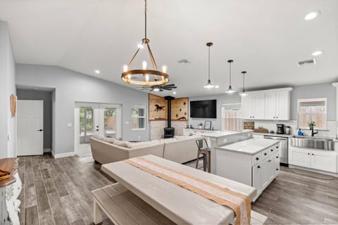 Spacious open-concept living — cook, dine, and relax in style with a modern kitchen, cozy lounge