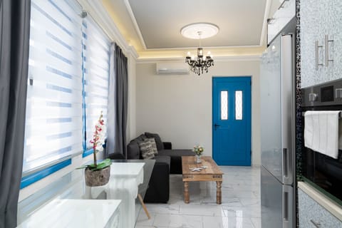 Deluxe Suite, Jetted Tub, Sea View | Living area | 42-inch LED TV with satellite channels, TV