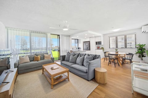 The open plan living area is light-filled and spacious.