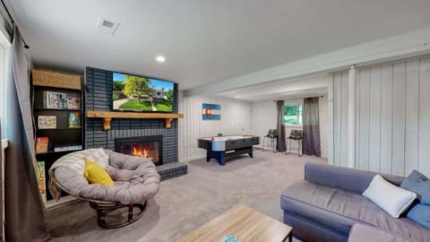 Fully furnished basement with air hockey