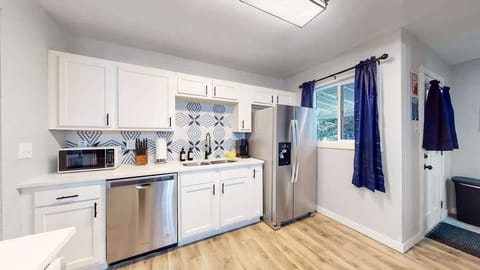 Unleash your inner chef in this gorgeous and functional kitchen.