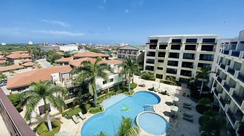 Enjoy your day with this crystal blue outdoor swimming pool.