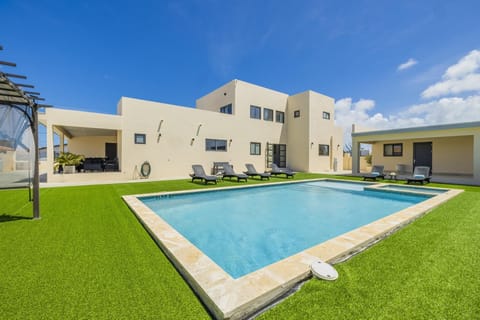 Enjoy your own private pool with a sitting area and jets.