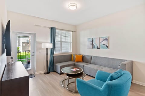 Luxurious Elegance: Step into sophistication with our impeccably designed living room, where modern aesthetics meet timeless comfort.