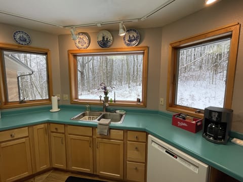 Kitchen with special welcome treats for guests by coffee maker