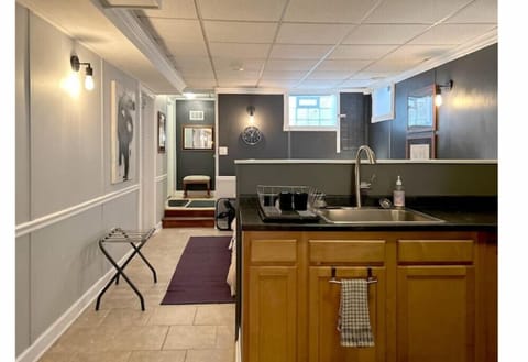 Kitchen leads into the bedroom nook.